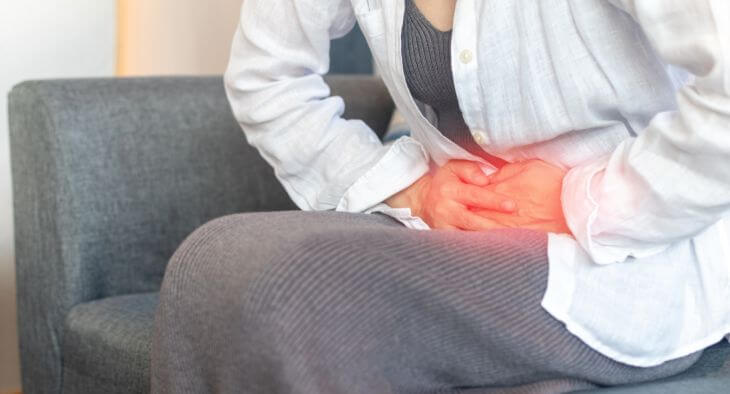 A woman suffering from pelvic pain